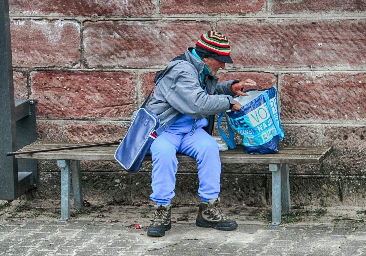 Homeless man on bench